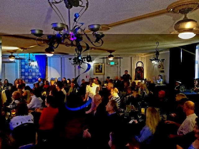 Large crowd gathered at Adams Mystery Playhouse for Police Week Murder Mystery dinner